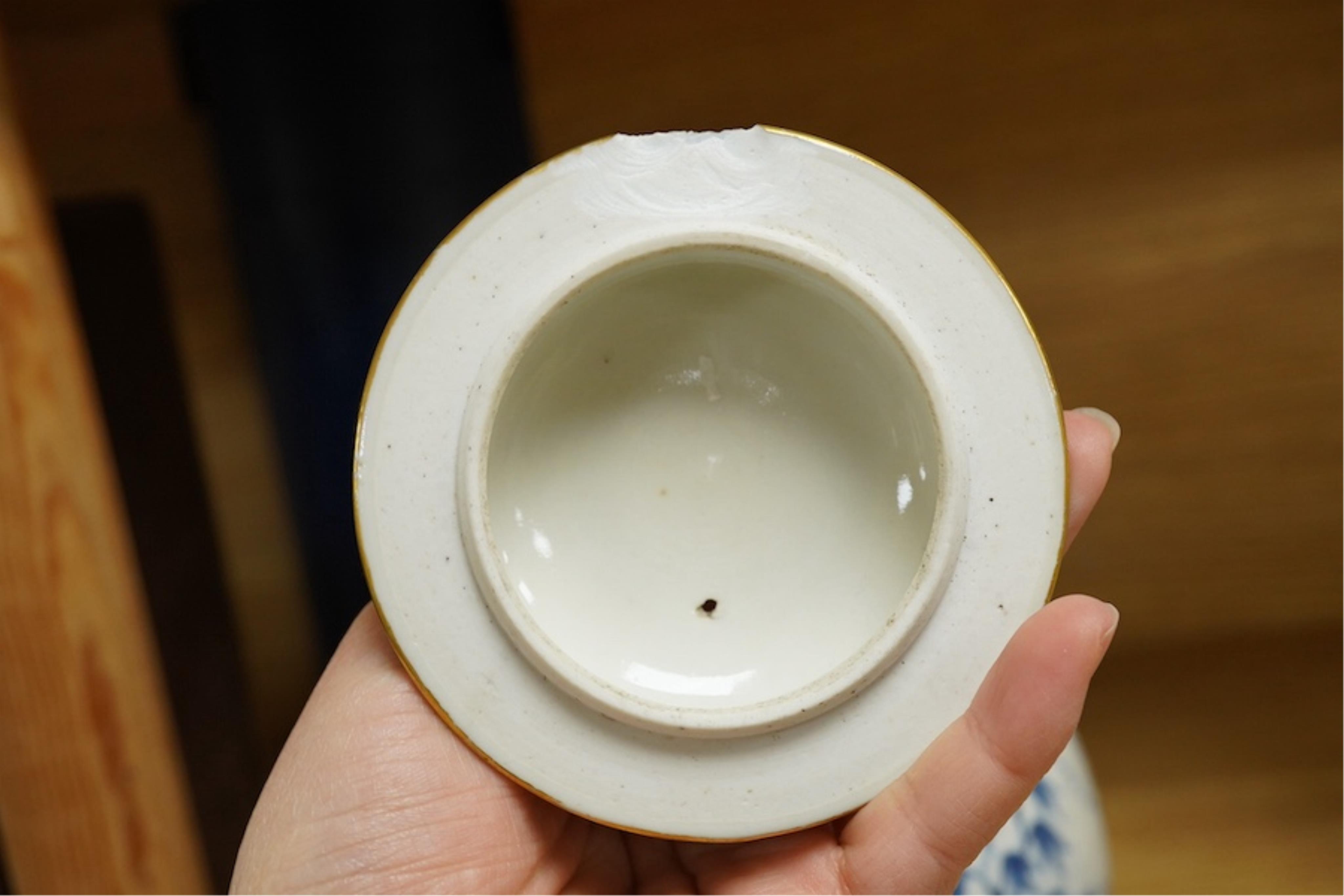 A Chinese export blue and white teapot, c.1790, painted with pagodas, 24cm wide. Condition - some chipping and firing cracks